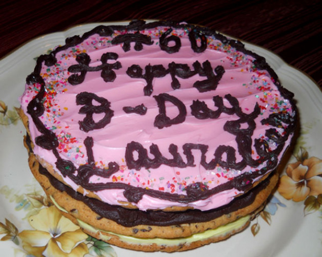 Very large cookies with frosting in between - pink top with Happy Birthday
