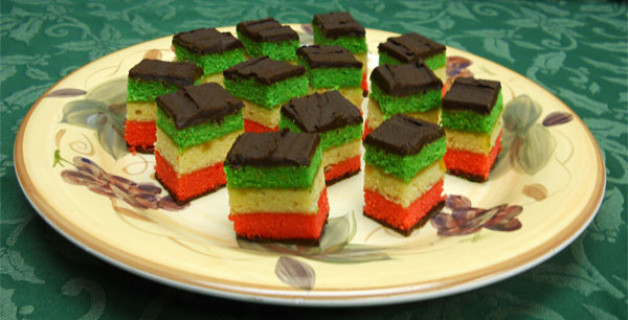 Cake-like layers in red white green like the Italian flag - topped with chocolate