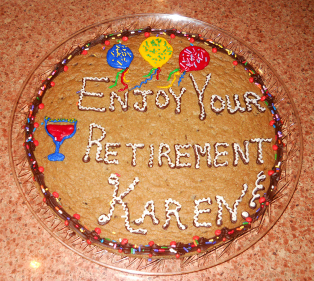Gigantic chocolate chip cookie decorated for retirement event