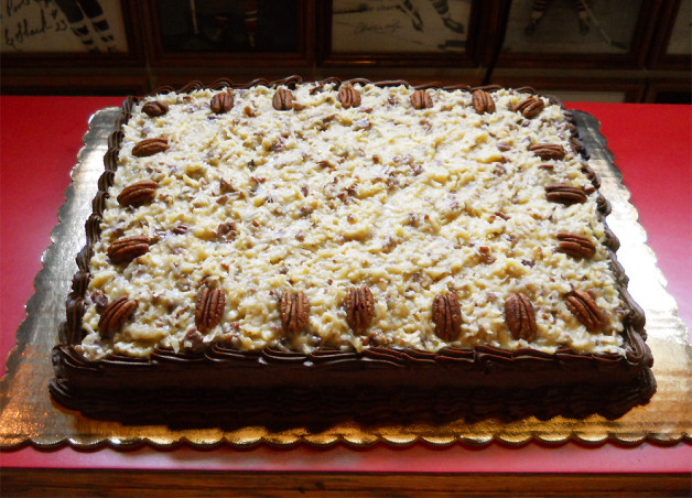 Classic German Chocolate cake prettily displayed before cutting