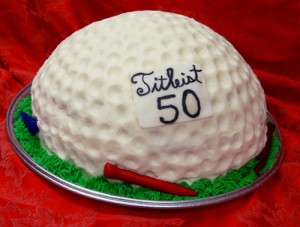 Golf Ball cake with a tee and 50 on it it (Birthday)
